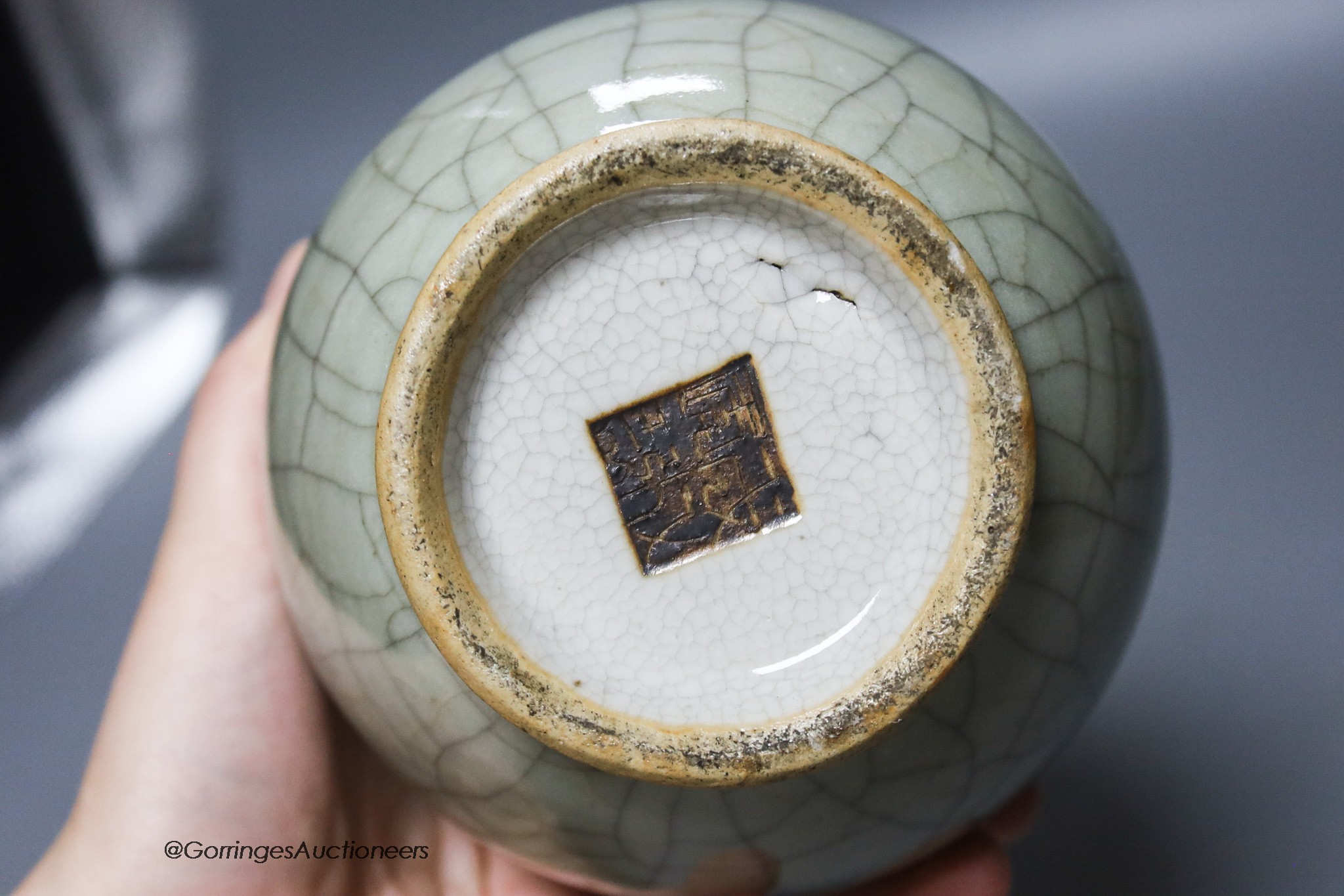 A Chinese crackleglaze vase, a blue and white brush pot and a green glazed brush pot, tallest 22cm